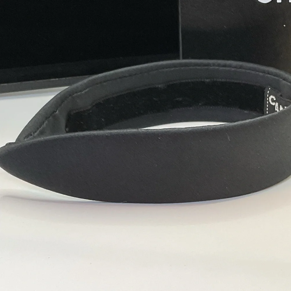 CHANEL Black Headband with Gold Logo Accent